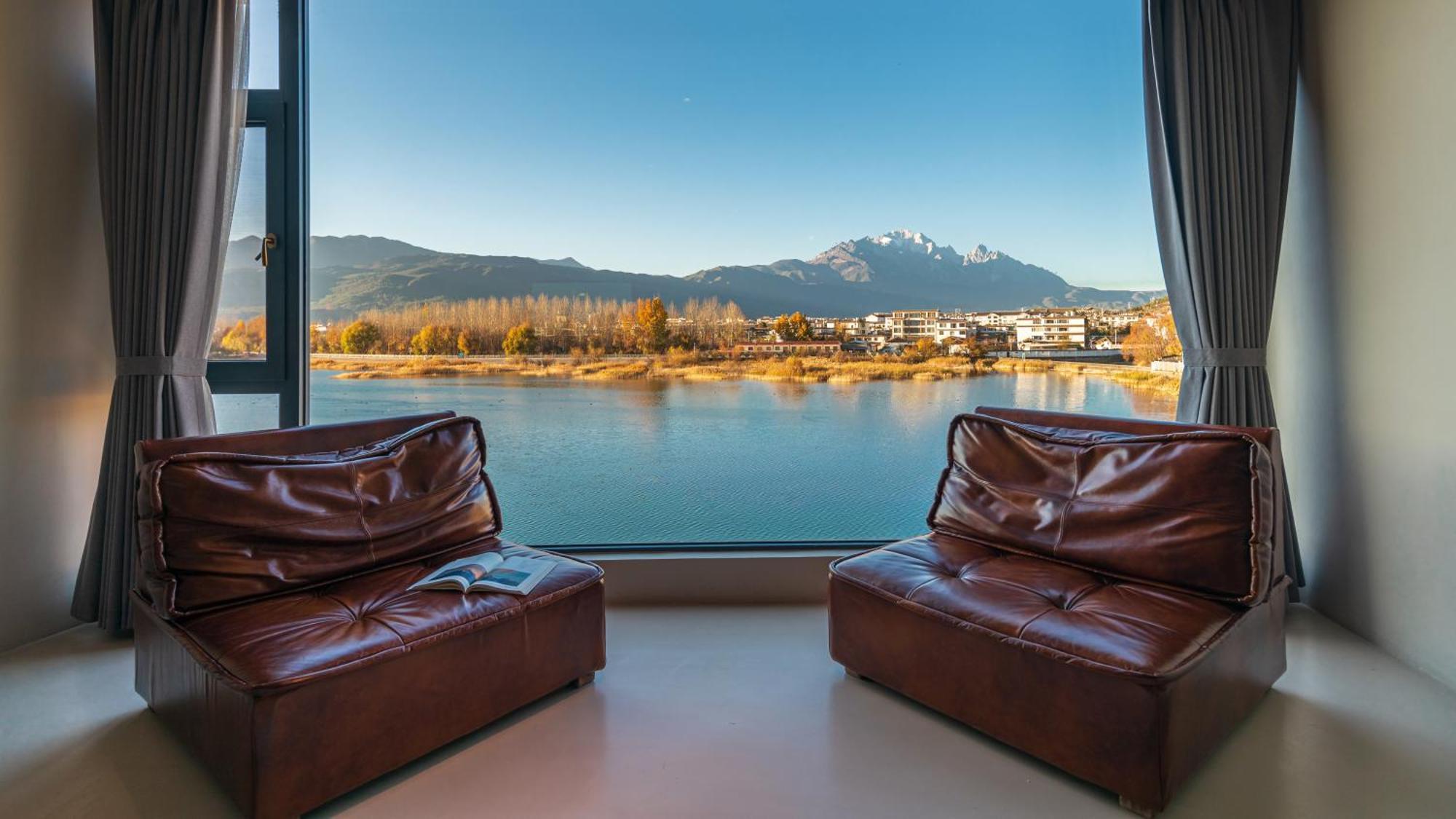 Half Pond White House Hotell Lijiang  Exteriör bild