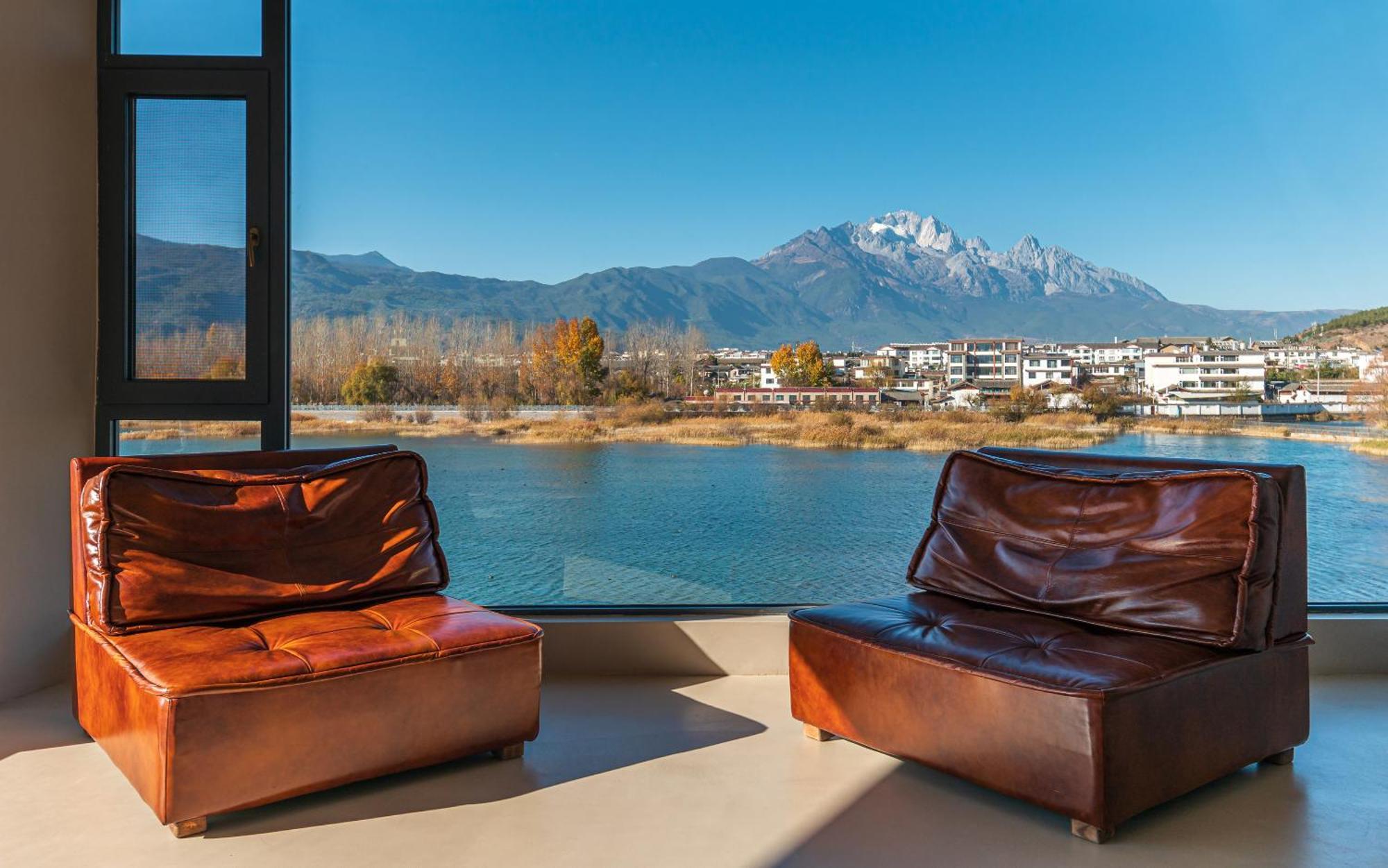 Half Pond White House Hotell Lijiang  Exteriör bild